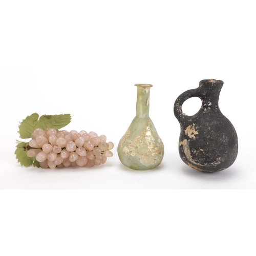 532 - Roman style Glass and terracotta vessels together with a Chinese hardstone bunch of grapes, the larg... 