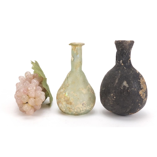 532 - Roman style Glass and terracotta vessels together with a Chinese hardstone bunch of grapes, the larg... 