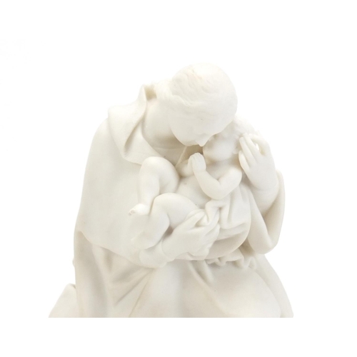 860 - Parian figure group of mother and child on donkey back, 26cm high