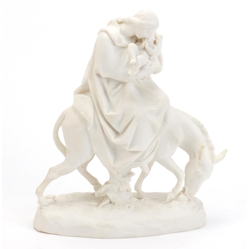 860 - Parian figure group of mother and child on donkey back, 26cm high