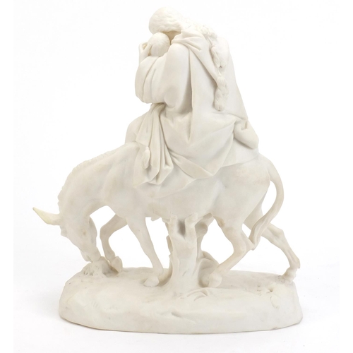 860 - Parian figure group of mother and child on donkey back, 26cm high