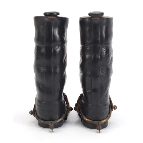 966 - Pair of porcelain boot design hip flasks with brass stirrups, each 16.5cm high