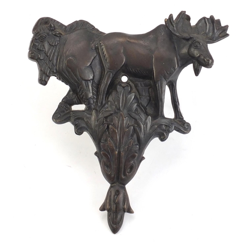 885 - Heavy patinated bronze wall mount of a bison and moose, 23cm high