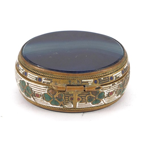 344 - Oval enamelled brass and blue agate patch box with hinged lid, 5cm wide