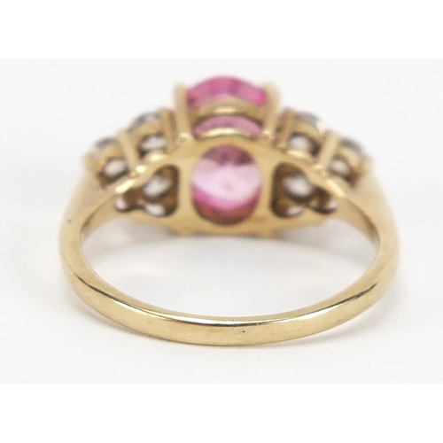 318 - 9ct gold pink and white cubic zirconia ring, size L, 2.8g