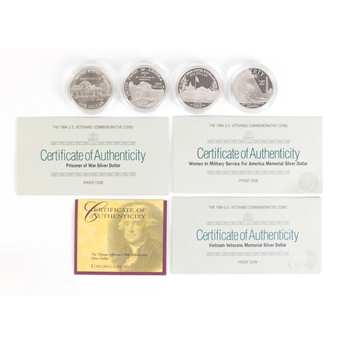 550 - Four American silver dollars with certificates of authenticity including 1993 Thomas Jeffersen 250th... 