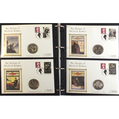 1331 - Commemorative coin covers arranged in an album including silver 1oz kookaburra, China red copper pan... 