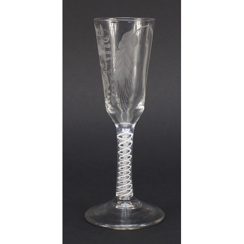 75 - 18th century ale glass with opaque twist stem, the ogee bowl engraved with crops and barley, 19cm hi... 