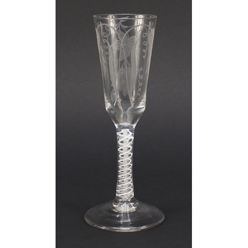 75 - 18th century ale glass with opaque twist stem, the ogee bowl engraved with crops and barley, 19cm hi... 