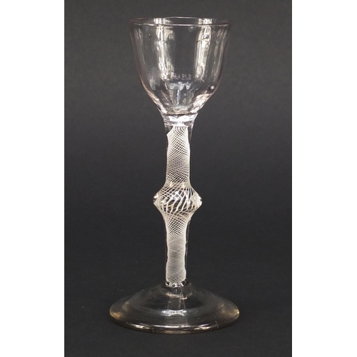 76 - 18th century wine glass with moulded bowl and knopped open twist stem, 15cm high