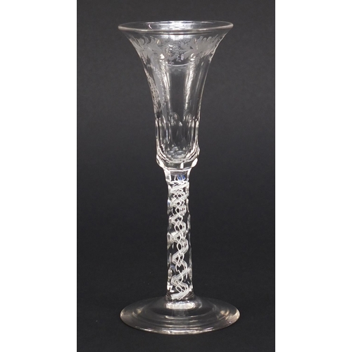 78 - 19th century wine glass with opaque twist faceted stem and engraved bowl, 15cm high