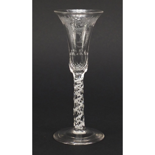 78 - 19th century wine glass with opaque twist faceted stem and engraved bowl, 15cm high