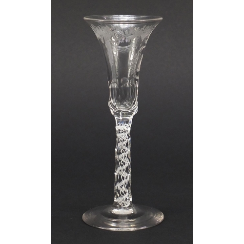 78 - 19th century wine glass with opaque twist faceted stem and engraved bowl, 15cm high