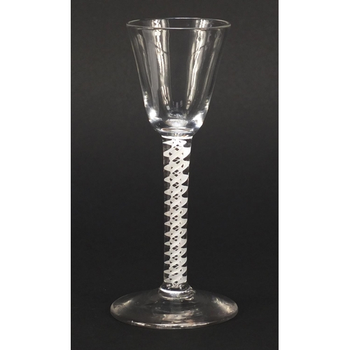 77 - 18th century wine glass with funnel bowl and multiple double series opaque twist stem, 15cm high