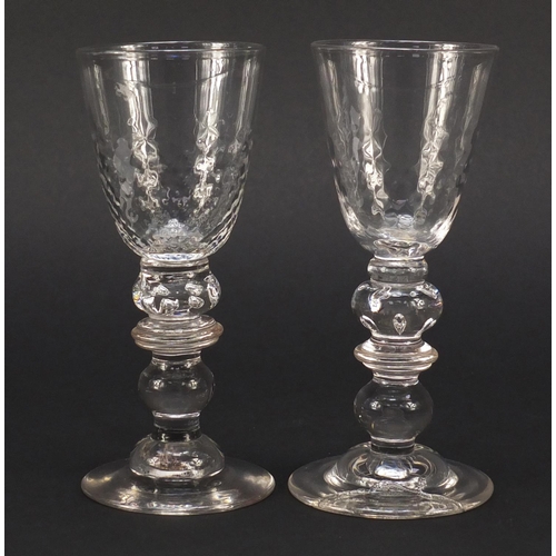 384 - Matched pair of early 19th century ale glasses with knopped baluster stems, each 16cm high