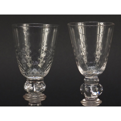 384 - Matched pair of early 19th century ale glasses with knopped baluster stems, each 16cm high