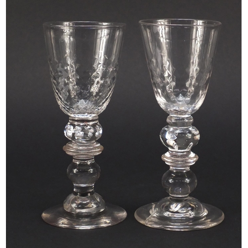 384 - Matched pair of early 19th century ale glasses with knopped baluster stems, each 16cm high