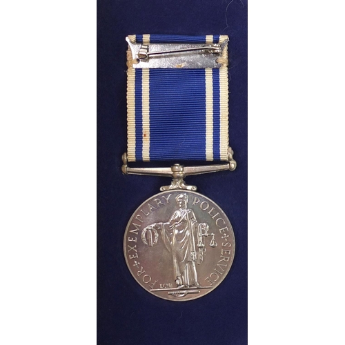 805 - WITHDRAWN -Police long service and good conduct medal awarded to CONST.JOHN.A.SCHOOLEY