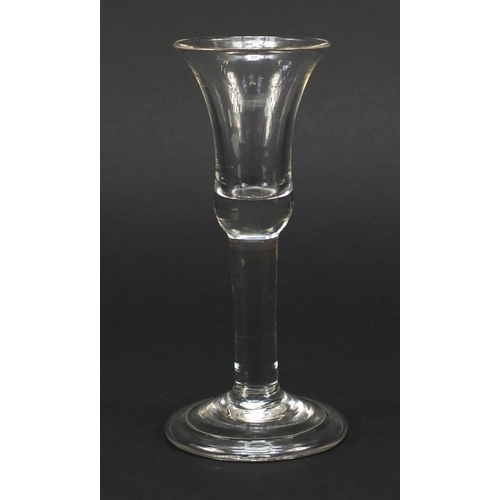 326 - 18th century wine glass with bell shaped bowl and folded foot, 15.2cm high