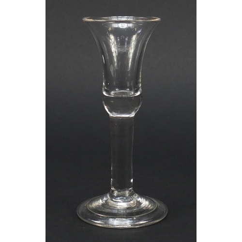 326 - 18th century wine glass with bell shaped bowl and folded foot, 15.2cm high