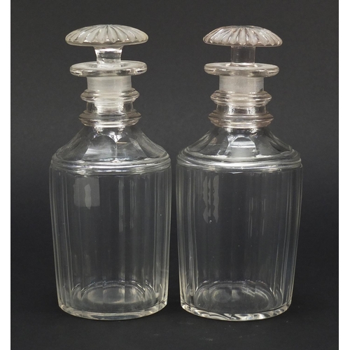 458 - Pair of 19th century glass decanters with mushroom stoppers, each 19cm high