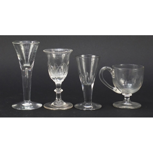 556 - 18th century and later glassware including a small Newcastle green wine glass with two ball knop, wi... 