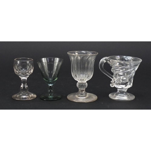 556 - 18th century and later glassware including a small Newcastle green wine glass with two ball knop, wi... 