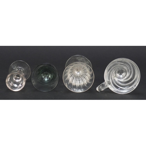 556 - 18th century and later glassware including a small Newcastle green wine glass with two ball knop, wi... 