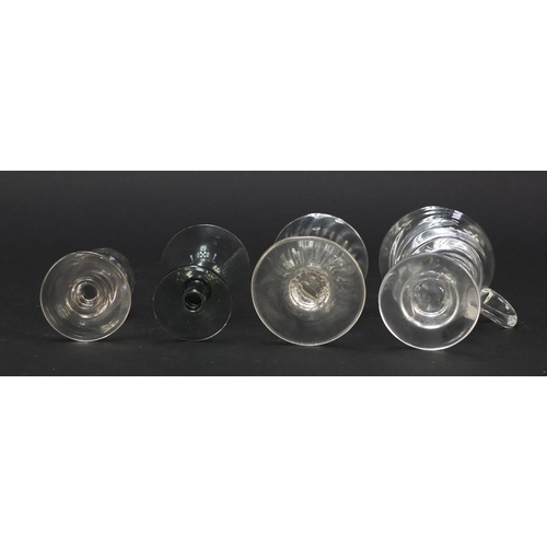 556 - 18th century and later glassware including a small Newcastle green wine glass with two ball knop, wi... 