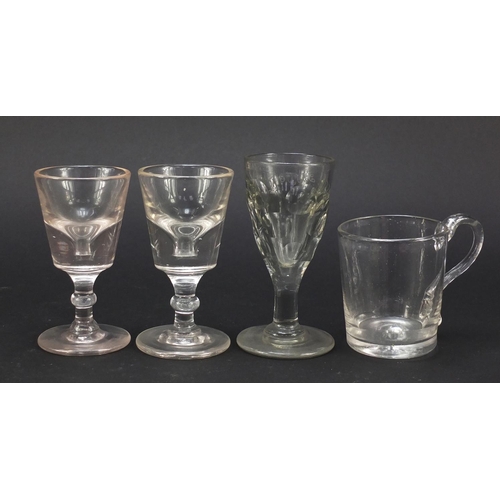 556 - 18th century and later glassware including a small Newcastle green wine glass with two ball knop, wi... 