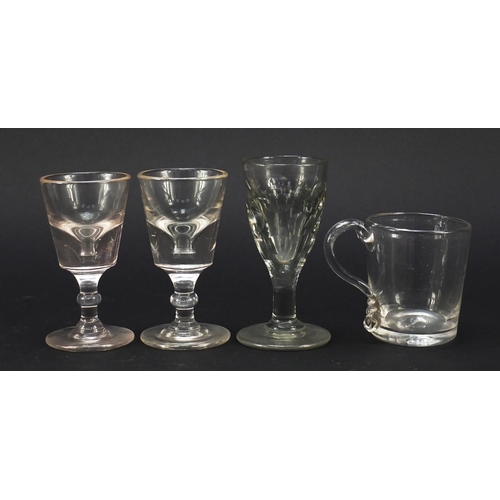 556 - 18th century and later glassware including a small Newcastle green wine glass with two ball knop, wi... 