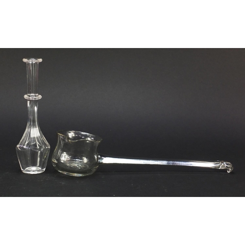 559 - 18th century glass punch ladel and a toddy lifter with faceted stem and ring collar, the largest 27.... 