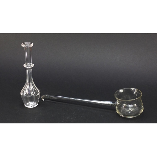 559 - 18th century glass punch ladel and a toddy lifter with faceted stem and ring collar, the largest 27.... 