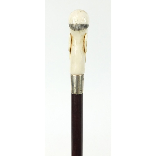 172 - Good snakewood walking stick with carved ivory pommel in the form of a man and ivory ferrule, 94cm i... 