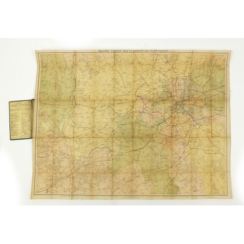 615 - Four antique folding maps comprising WH Smith & Sons Railway Map of London and Environs, Post Office... 