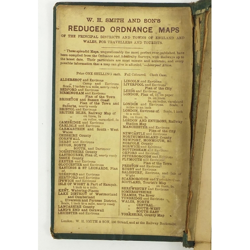 615 - Four antique folding maps comprising WH Smith & Sons Railway Map of London and Environs, Post Office... 