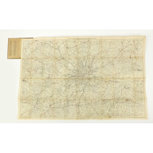 615 - Four antique folding maps comprising WH Smith & Sons Railway Map of London and Environs, Post Office... 