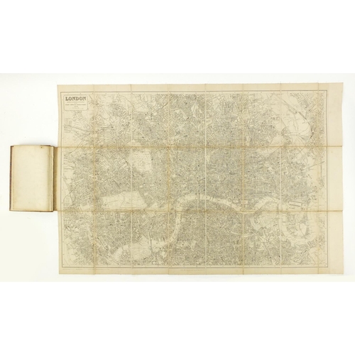 615 - Four antique folding maps comprising WH Smith & Sons Railway Map of London and Environs, Post Office... 