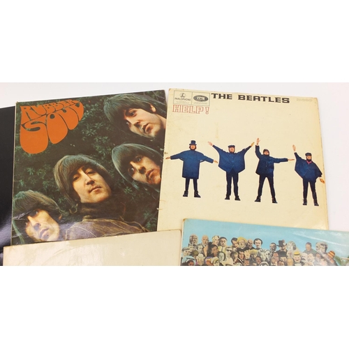 1463 - The Beatles vinyl LP's including White album with four photographs numbered 0509649, Rubber Soul, He... 