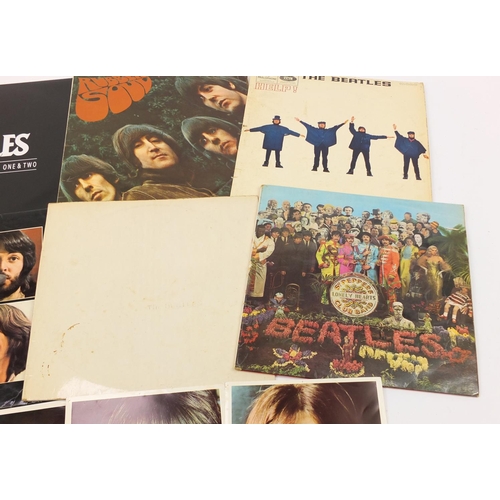 1463 - The Beatles vinyl LP's including White album with four photographs numbered 0509649, Rubber Soul, He... 