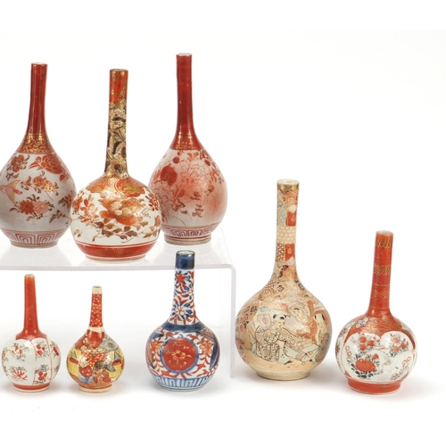 633 - Eleven Japanese Kutani porcelain vases and an Imari example, the largest 18.5cm high