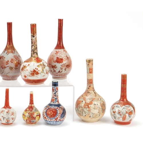 633 - Eleven Japanese Kutani porcelain vases and an Imari example, the largest 18.5cm high