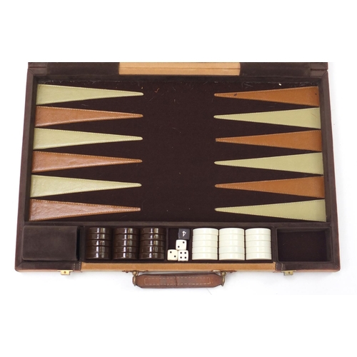 1364 - Suede travelling backgammon set retailed by Harrods