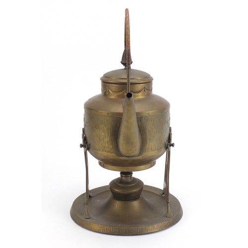 183 - Continental brass Arts and Crafts aesthetic kettle on stand with wicker handle, 44cm high