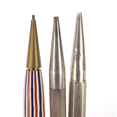 812 - Two silver propelling pencils and one other, the largest 12.7cm in length