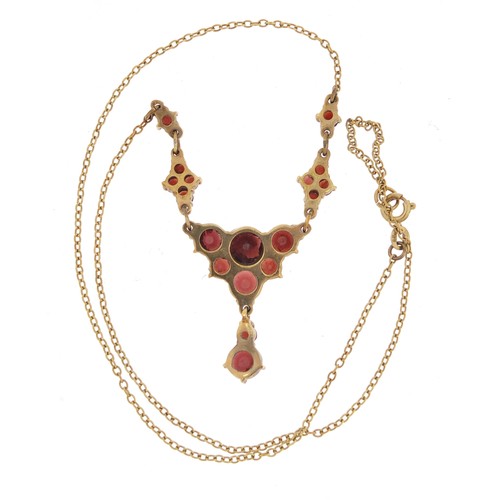 875 - 9ct gold garnet necklace, 40cm in length, 5.2g