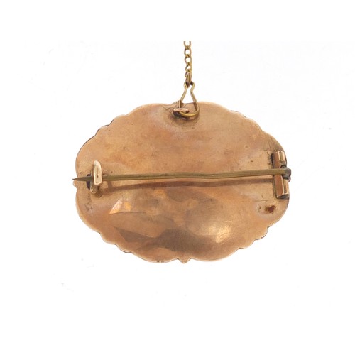 251 - Victorian unmarked gold mourning brooch, (tests as 9ct gold) 3.5cm in length, 10.4g