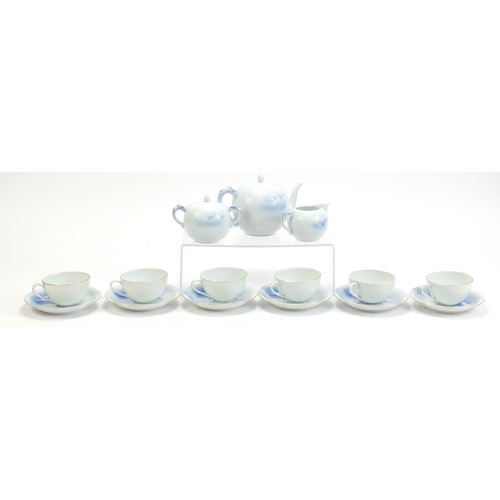 1515 - Japanese Fukagawa six place teaset hand painted with Mount Fuji, the teapot 18.5cm in length