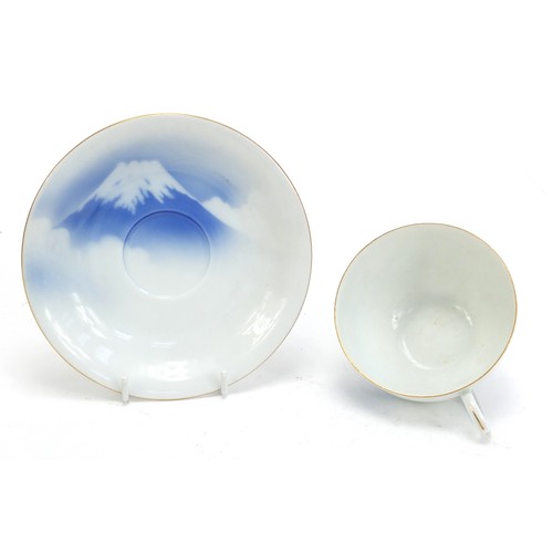 1515 - Japanese Fukagawa six place teaset hand painted with Mount Fuji, the teapot 18.5cm in length