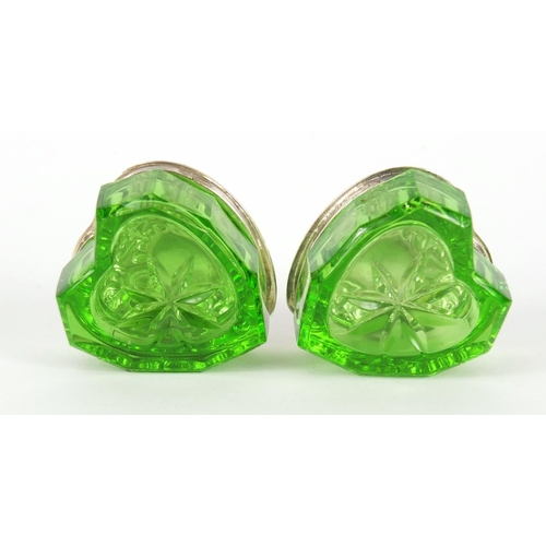 369 - Pair of sterling silver and green glass love heart shaped boxes, each 2cm high